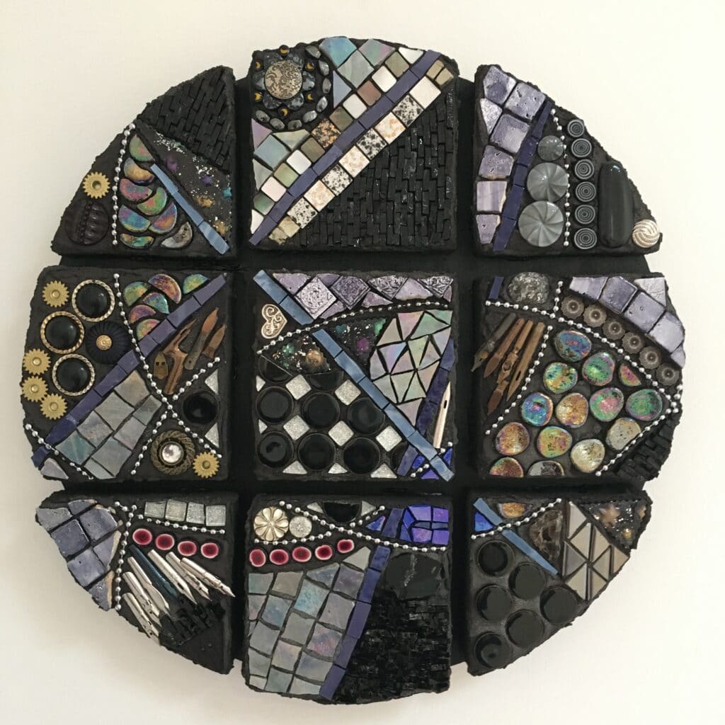 A round abstract work in black, silver and purple. The round is divided into 9 sections, separated by small gaps but connected by intersecting lines.